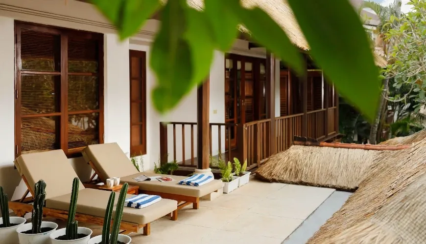 Tropical Bali villa balcony sunbeds at Villa The Seven