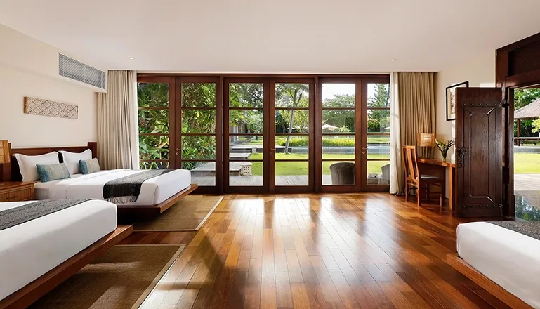 Elegant bedroom with a large bed and modern decor at Amita Villa