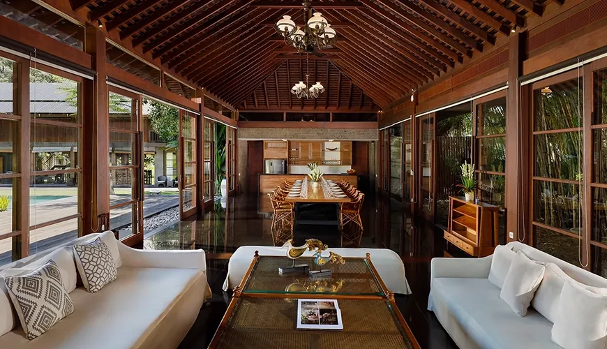 Elegant dining table set in an open-plan room at Amita Villa