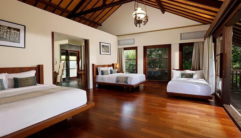 Serene sleeping space featuring minimalist decor and soft textures at Amita Villa