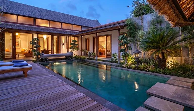 bumbak park luxurious villa private pool deck evening ambiance serene outdoor space canggu
