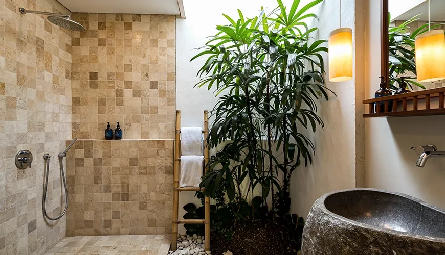 Modern bathroom stone sink indoor plant shower neutral tile design at Bumbak Park