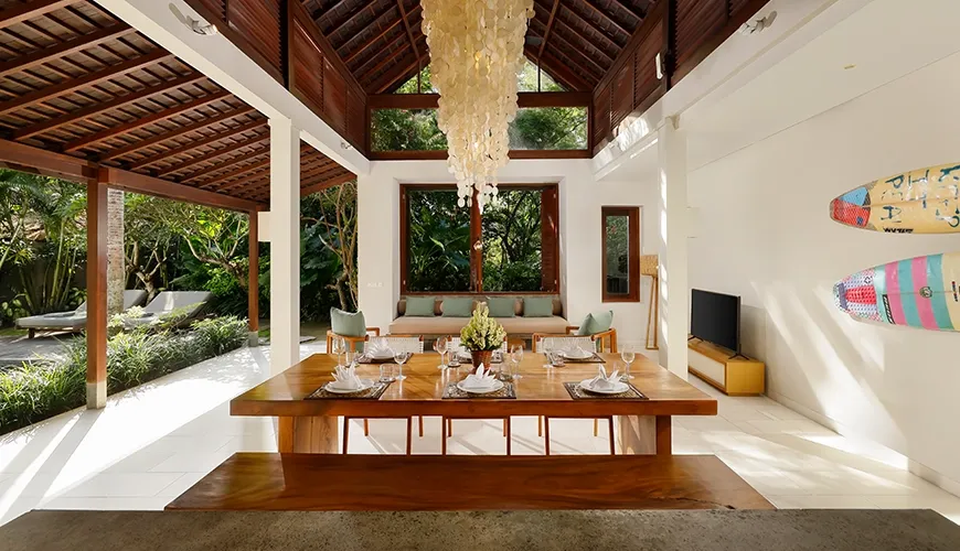 Open concept villa living dining area high ceilings shell chandelier at Bumbak Park