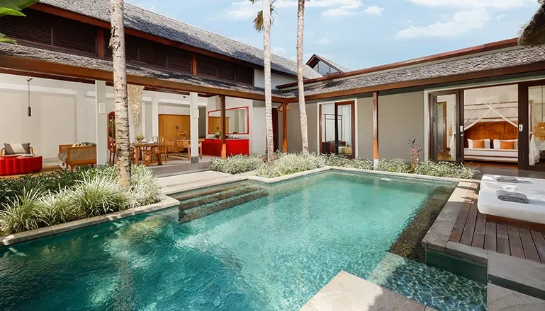 Spacious villa private pool courtyard design comfortable sun loungers outdoor living at Bumbak Park