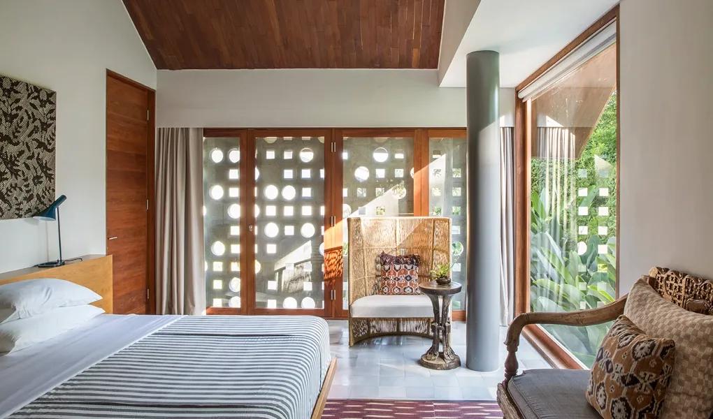 Hotel staff team smiling and posing on outdoor steps at casaBama