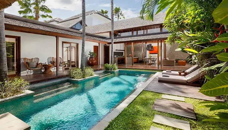 spacious villa private pool sun loungers wooden deck tropical surroundings in canggu