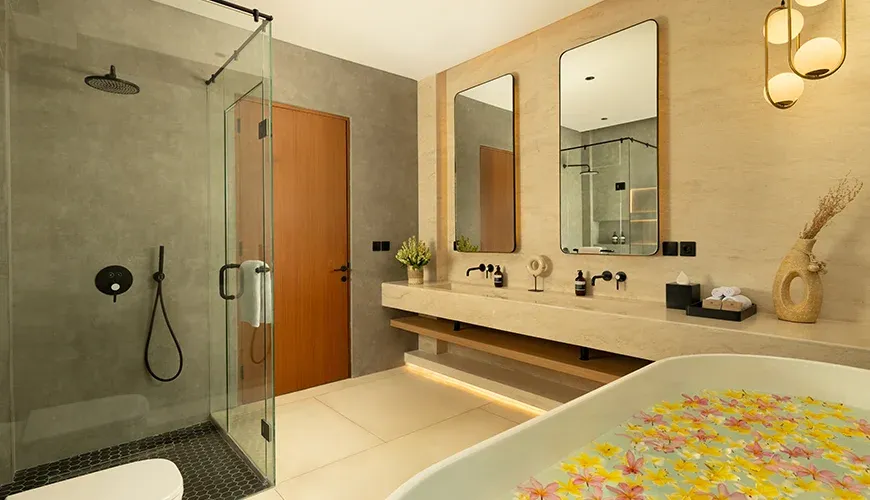 Luxurious bathroom featuring a standalone tub and modern vanity at Fenta Villa