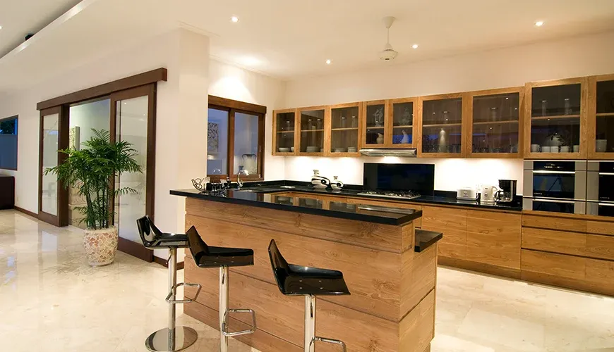 Modern villa kitchen with open layout and appliances at Istana Putih Villa