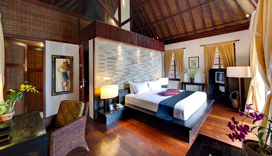 Elegant Bali bedroom traditional Balinese decor at Majapahit Villa Nataraj