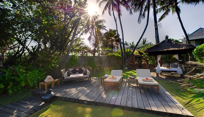 Bali villa outdoor lounge tropical garden at Majapahit Villa Raj