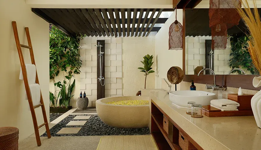 Elegant bathroom sanctuary with tropical garden at Nelayan Villa