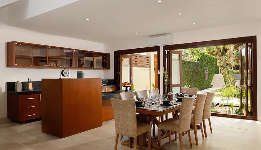 Spacious open-concept kitchen and dining with stylish design at Omegia Canggu
