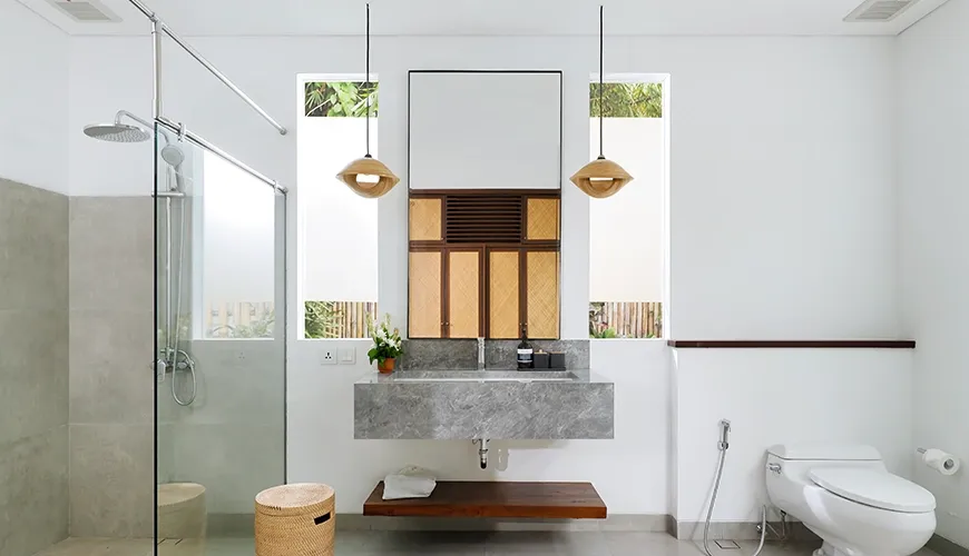 Modern bathroom with vessel sink shower and large window at Omekali