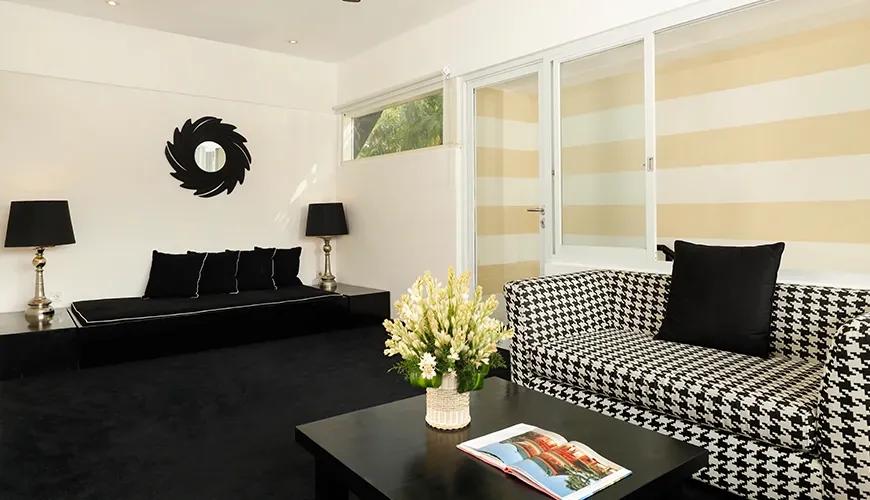 shanti-estate-contemporary-black-and-white-living-room-with-houndstooth-sofa-seminyak