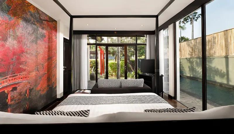 Japanese inspired bedroom featuring a stunning autumn bridge wall mural and a private poolside view at Shanti Estate