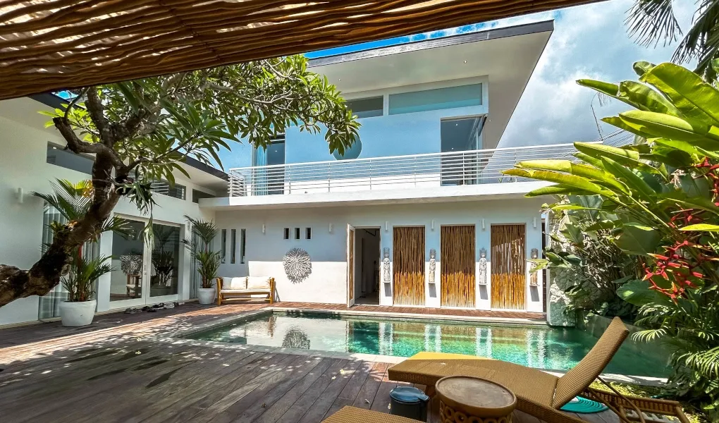 Modern villa with a private pool and wooden deck at The Suar Sanur