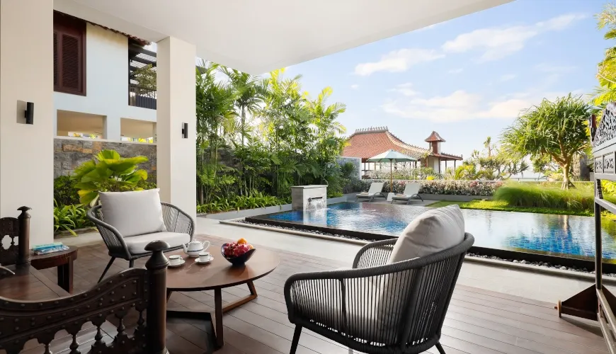 Luxury villa outdoor seating area with private pool at The Tulou Bali Villa
