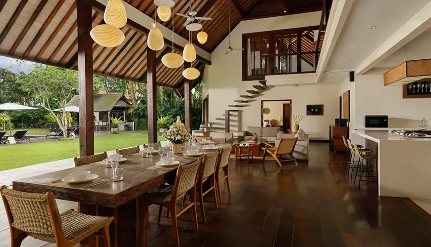 Beautiful dining space with natural light and traditional decor at Tirtadari Villa