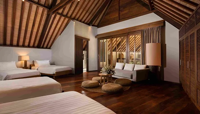 Bright bedroom with a comfortable bed and unique ceiling at Tirtadari Villa