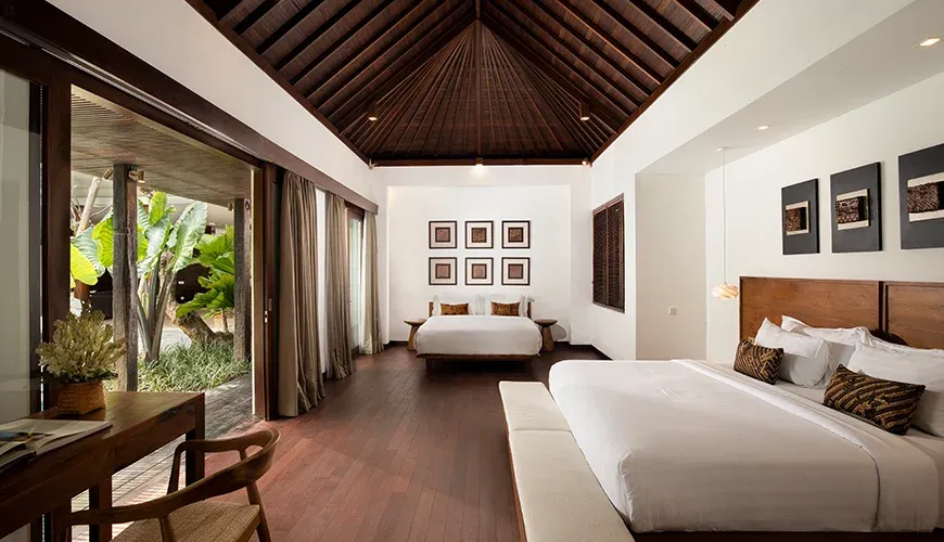 Luxurious Bali master bedroom features a king-size bed and elegant decor at Villa Ambara