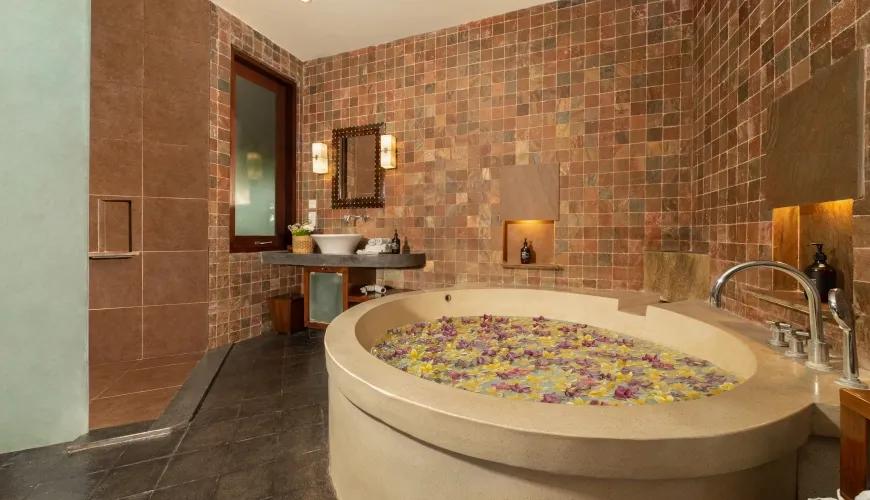Modern Circular Stone Bathtub in Private Ensuite at Villa Ambiente Bali