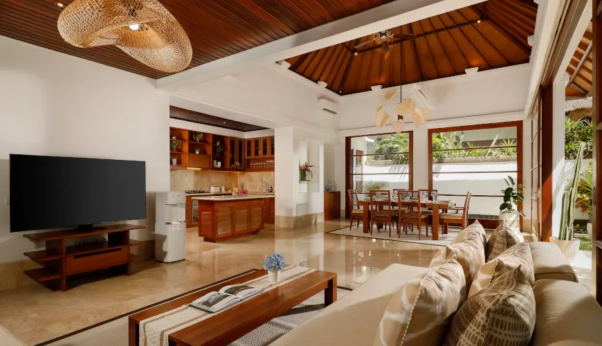 Elegant villa living area with a high ceiling and a large television at Villa Avaya