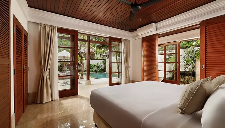 Luxury Bali villa bedroom with private pool access at Villa Avaya