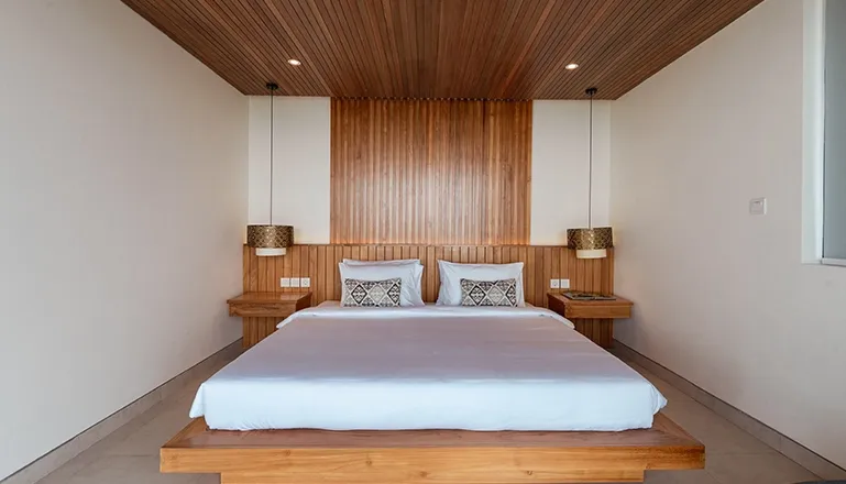 Spacious Bali bedroom with natural wood accents at Villa Avocagolf