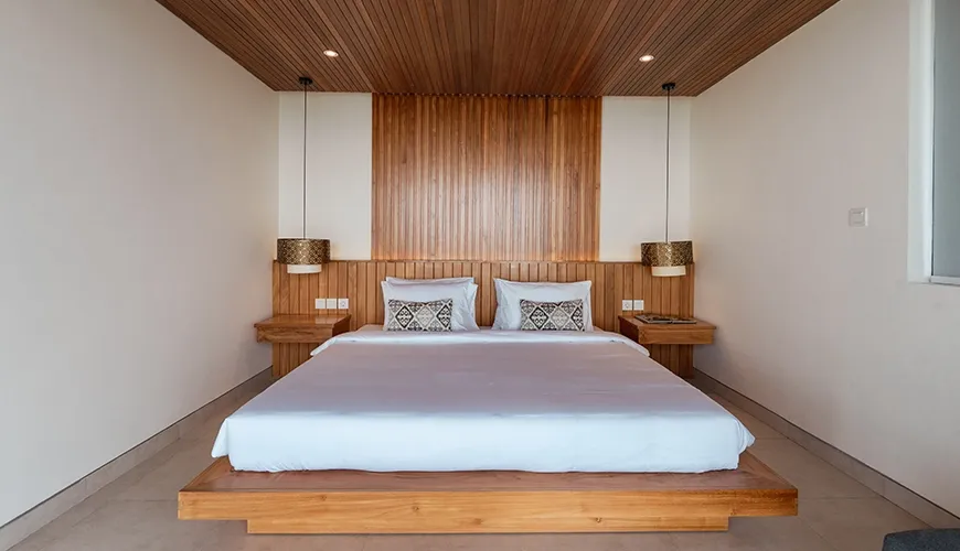 Spacious Bali bedroom with natural wood accents at Villa Avocagolf