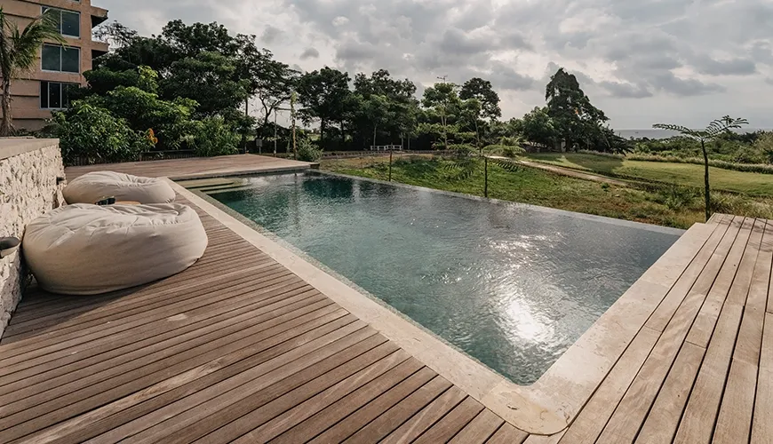 Bali villa private pool with spacious wooden deck at Villa Avocagolf