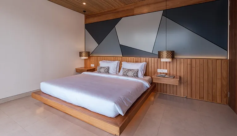 Unique Bali villa bedroom with artistic headboard at Villa Avocagolf