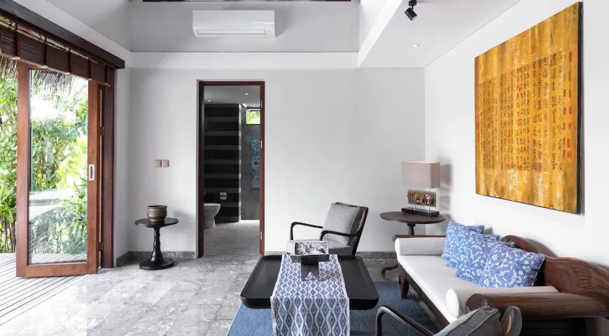 Comfortable living area with modern Balinese decor and marble flooring at Villa Bangkuang