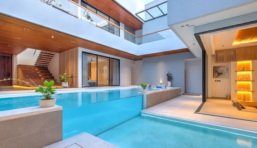 Luxurious modern villa with a unique glass-walled pool at Villa Brandon
