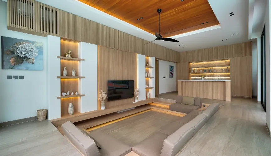 Modern villa living room with a sunken lounge area at Villa Brandon