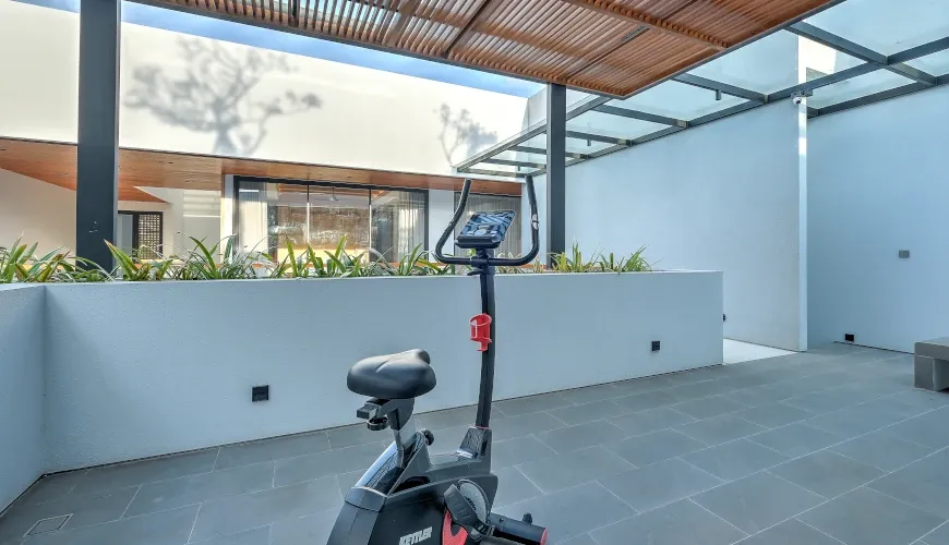 Outdoor workout area with an exercise bike and a view at Villa Brandon