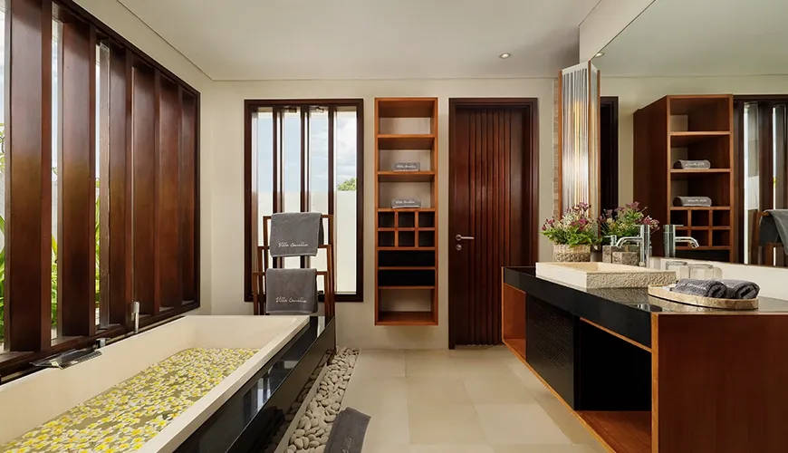 Luxury Bali villa master bathroom with relaxing bathtub at Villa Camellia