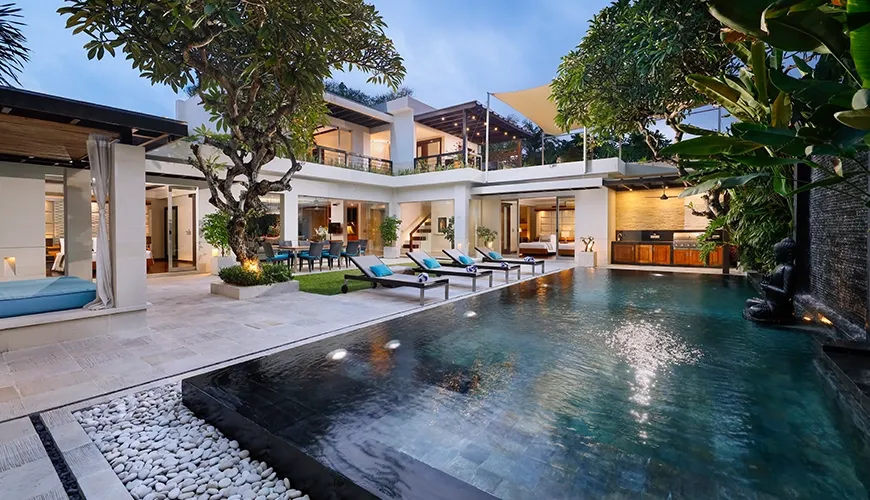 Luxury Bali villa private pool with sun loungers at Villa Camellia