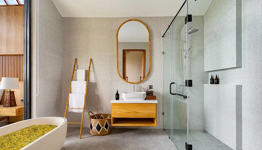 Modern spa bathroom with a soaking bathtub and walk-in glass shower featuring contemporary design at Villa Chanthira Luxe