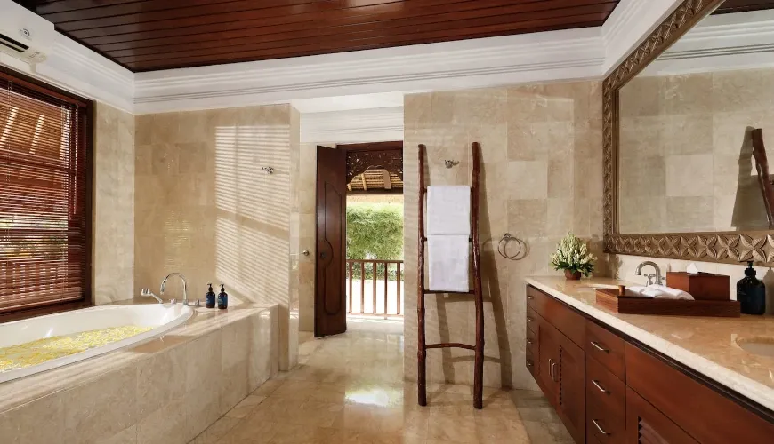 Bright bathroom, bathtub, outdoor view at Villa Danis