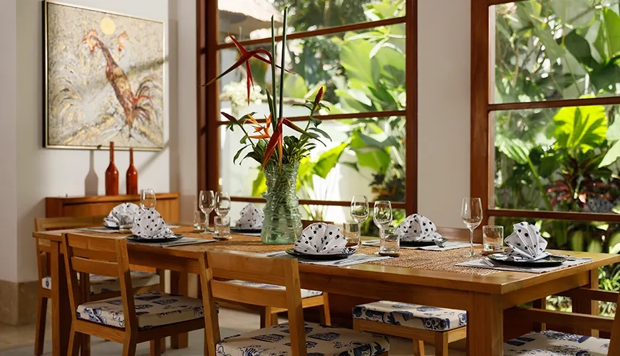 Elegant Bali villa dining area with tropical garden view at Villa Edward