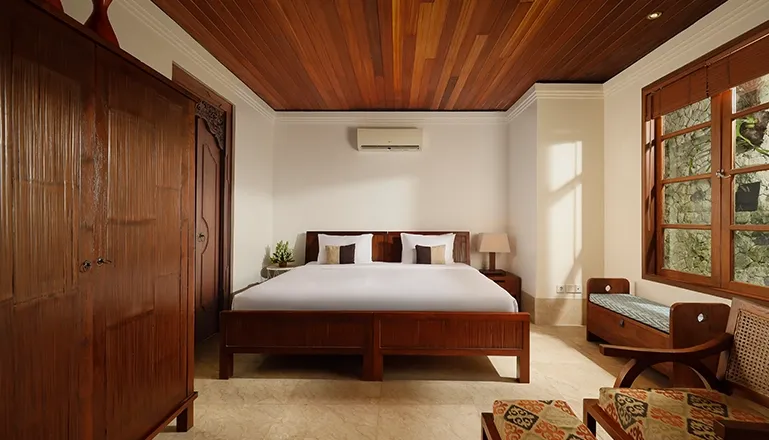 Luxury Bali villa bedroom with private outdoor access at Villa Edward