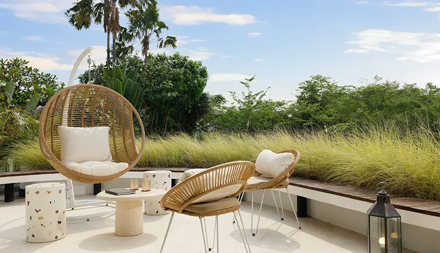 Relaxing outdoor terrace with comfortable seating and greenery at Villa Kalem Canggu