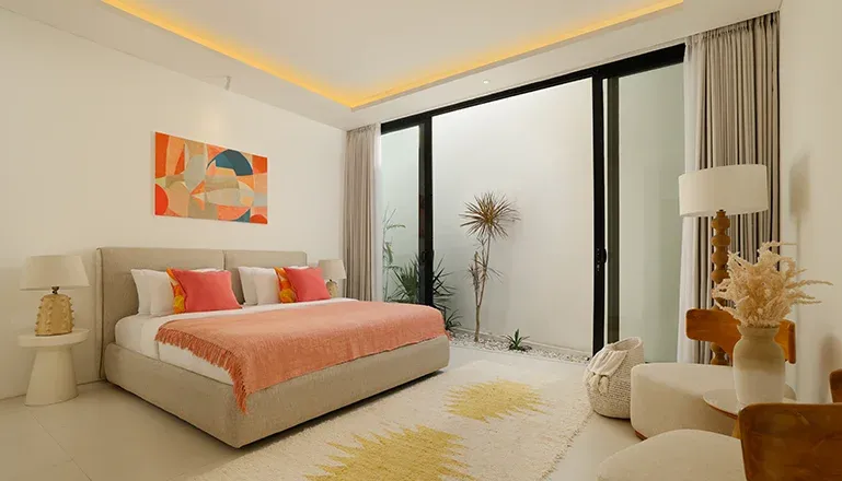 Serene sleeping space featuring minimalist decor and clean lines at Villa Kalem Canggu