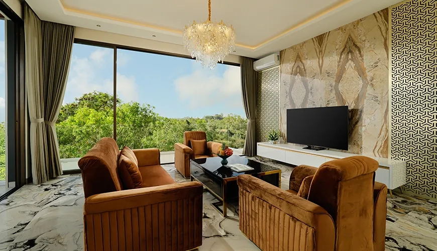 Stylish media room brown sofas modern chandelier large windows great view at Villa Kalem Uluwatu