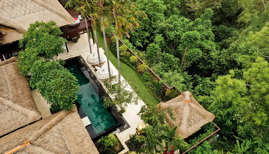 Aerial view of luxury villa with pool nestled in jungle at Villa Ken