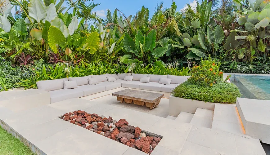 Modern patio featuring a unique sunken seating arrangement at Villa Morada