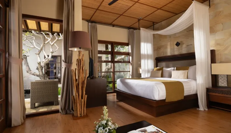 Comfortable bedroom, private patio, serene ambiance at Villa Nagasutra