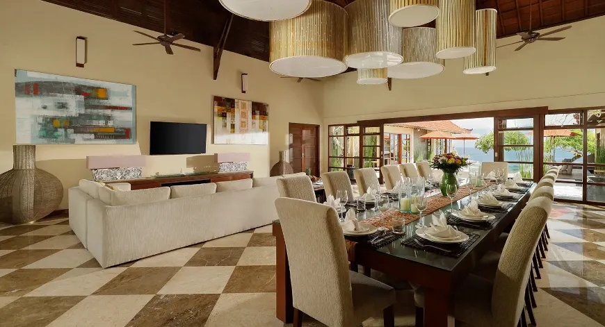 Grand dining room, luxurious living space, pool views at Villa Nagasutra