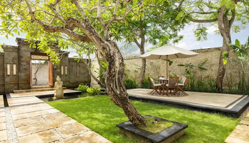 Inviting villa entrance, lush tropical garden at Villa Nagasutra