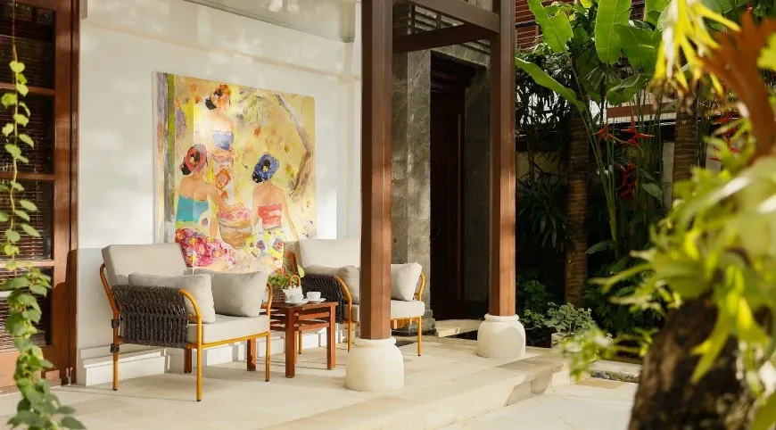 Inviting outdoor lounge, colorful artwork at Villa Nayra